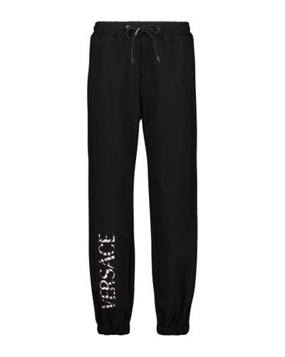 women's black versace textured logo sweatpants|Logo cotton sweatpants in black .